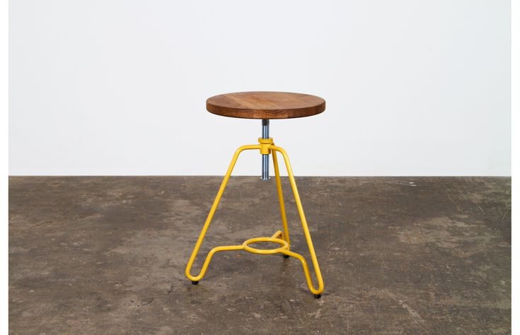 Briggs bar stool with wooden seat and metal yellow base