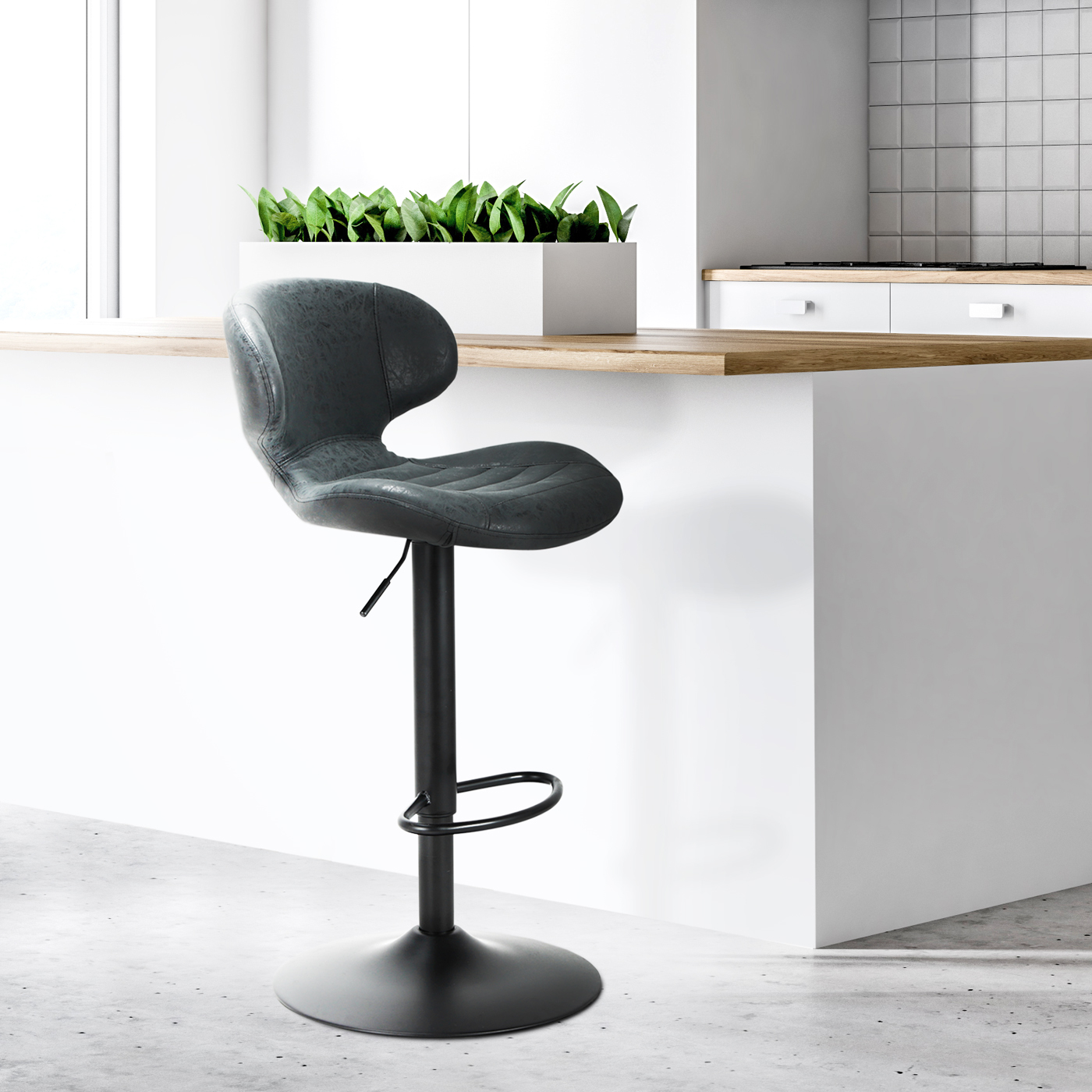 Nico faux leather bar stool in charcoal grey with adjustable height and 360 degree swivel