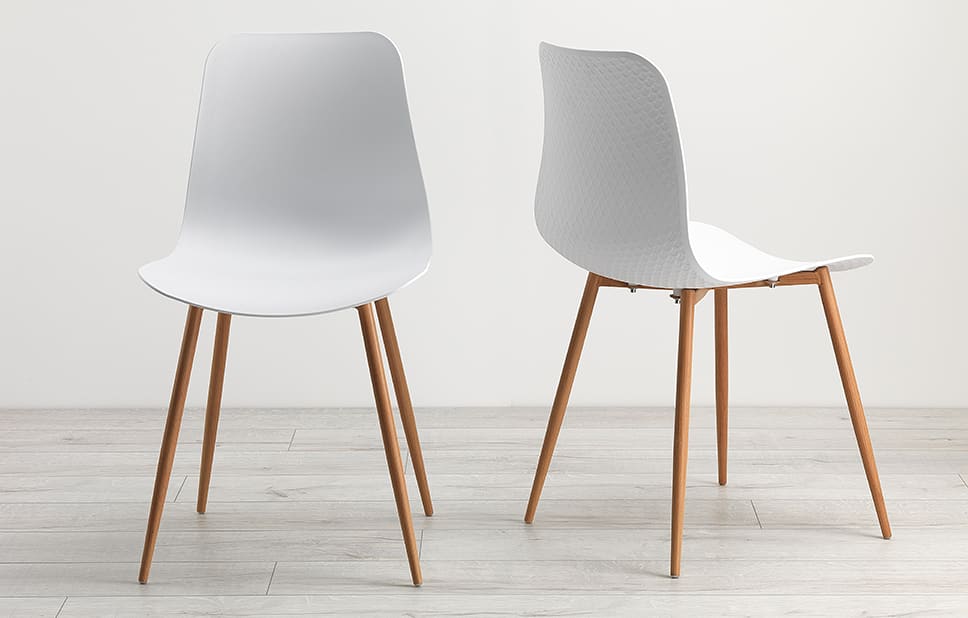 White Tulisa dining chairs with embossed backing texture
