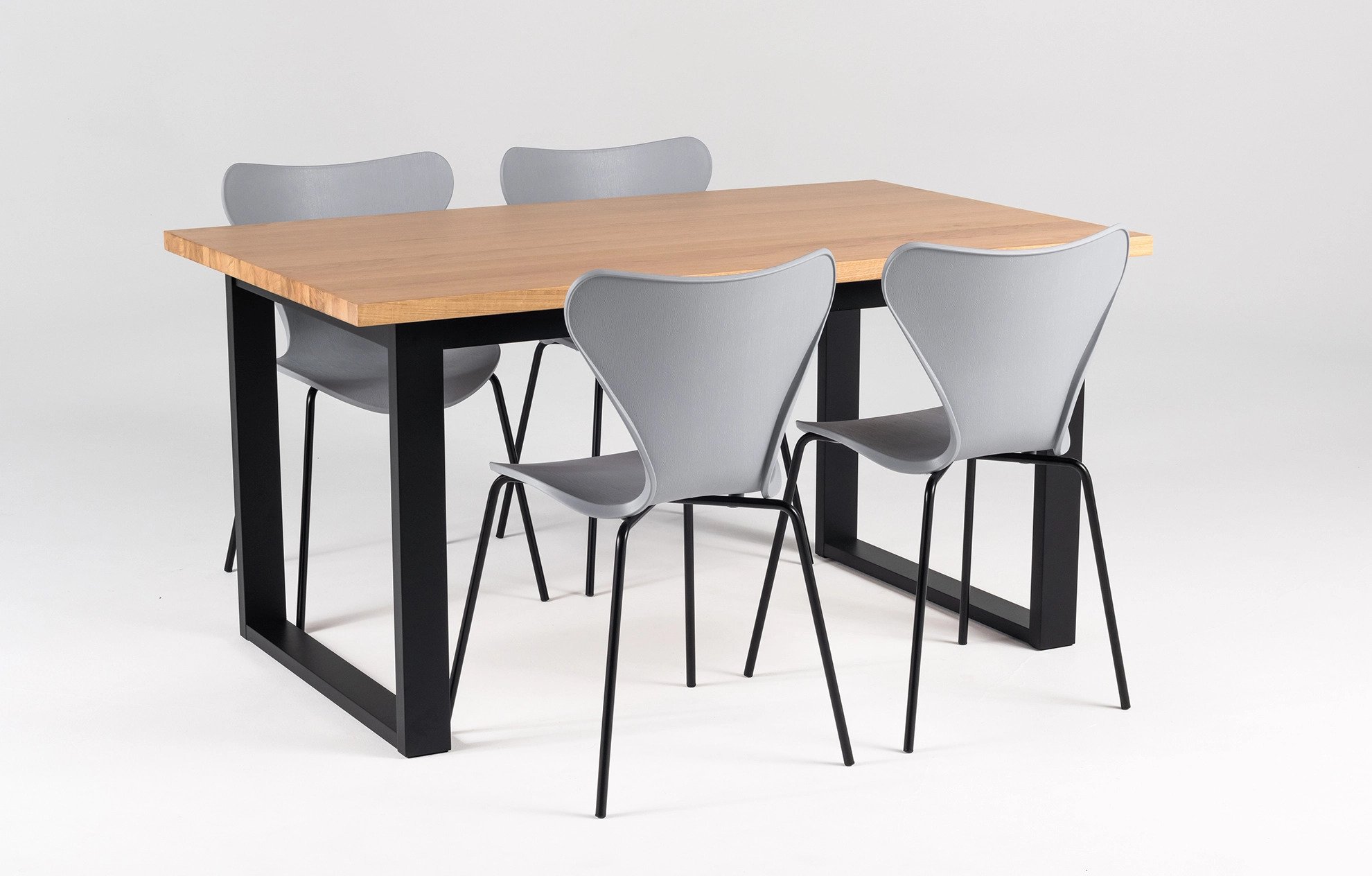 Shelton Fleur 4 seater designer dining set with an oak veneer table top and polypropylene chairs with steel legs